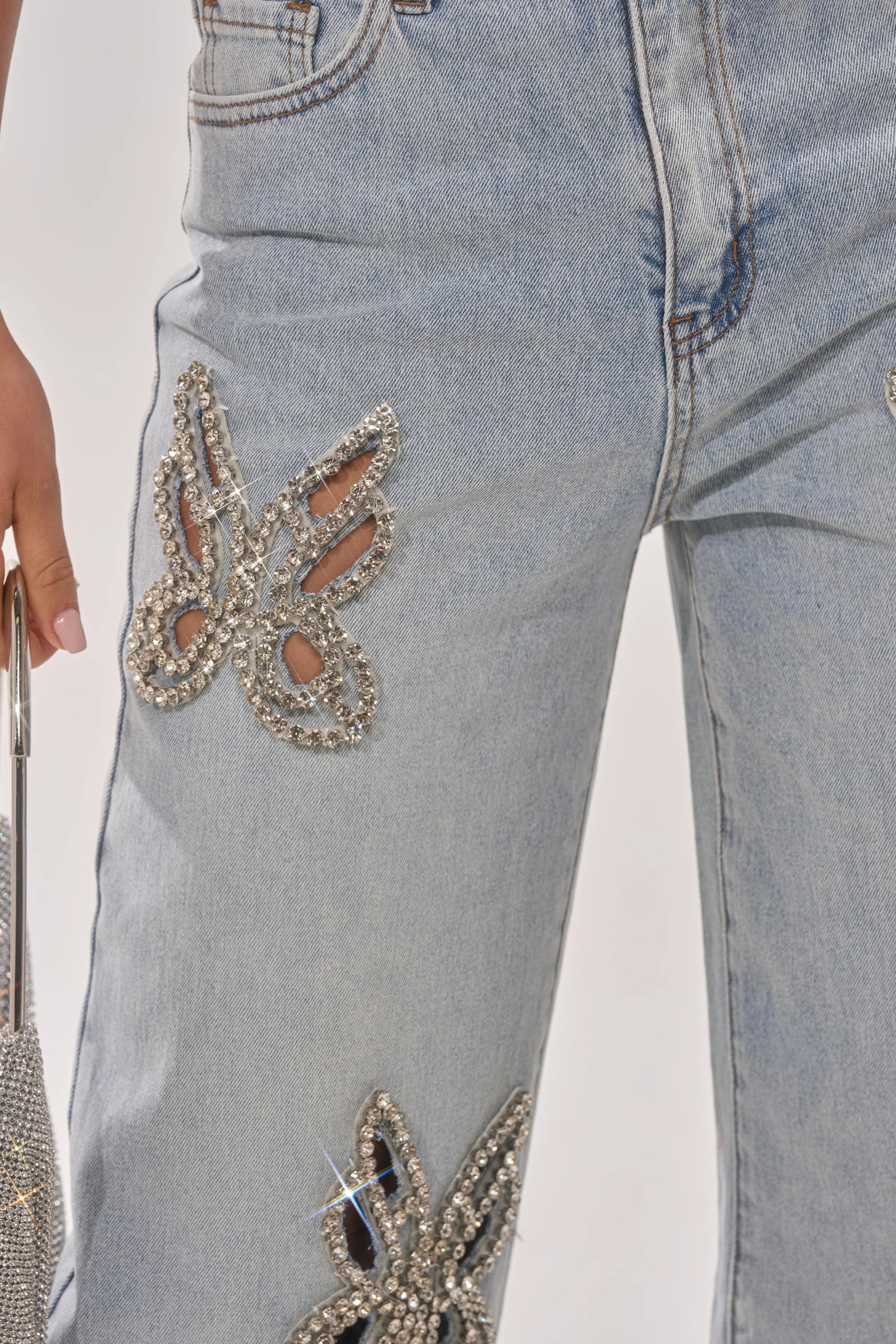 RHINESTONE BUTTERFLY CUTOUT DENIM JEANS